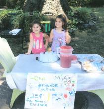Youth involved in missions hosting a lemonade stand for Kenya