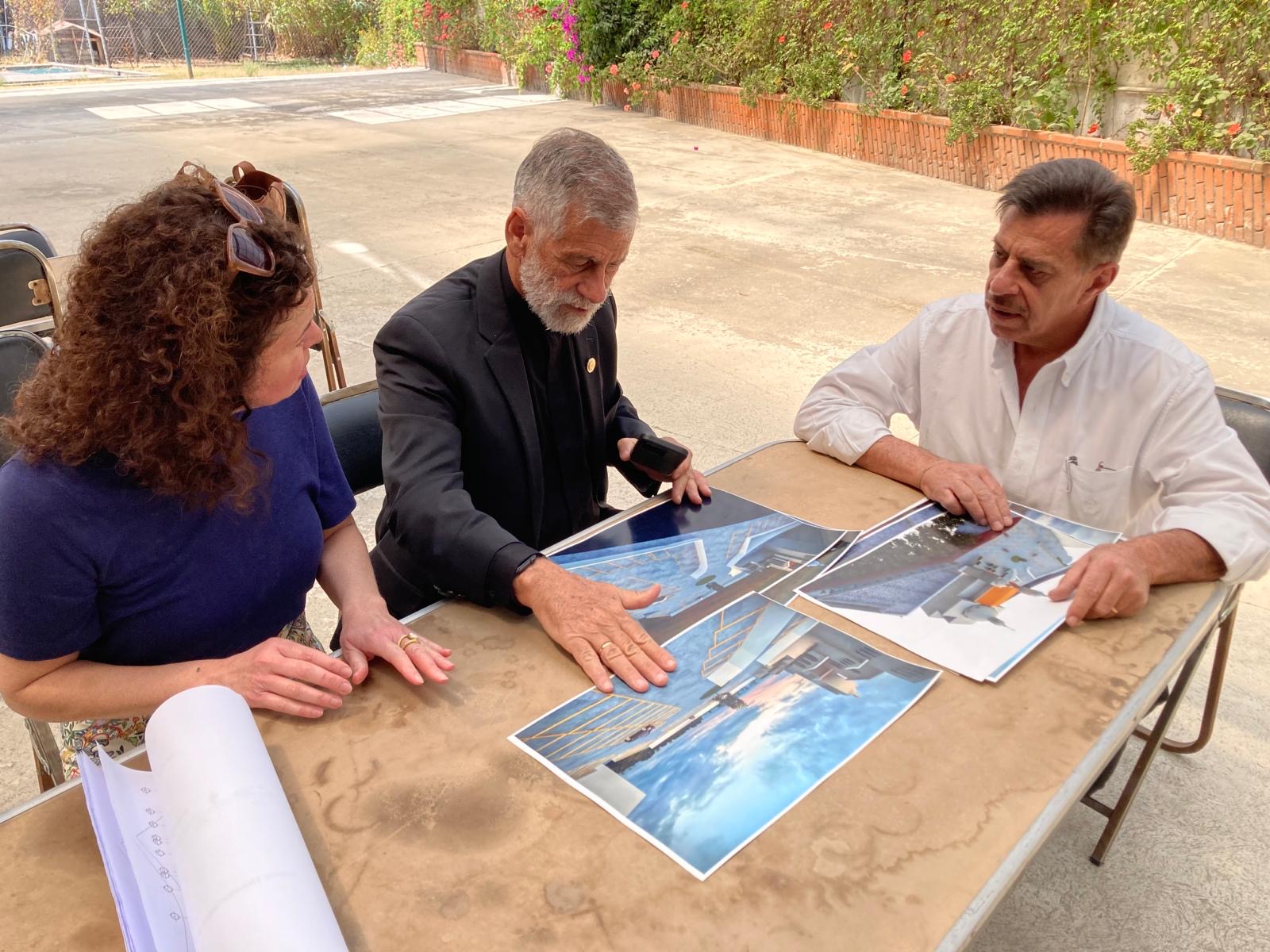 Fr. Martin and Santhe reviewing the plans for upcoming project (1).