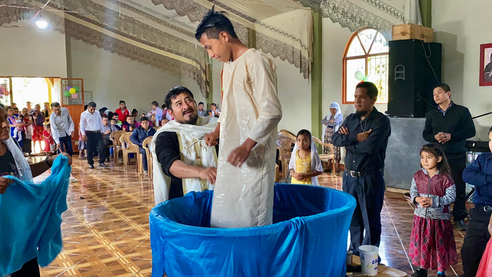 Fr. Evangelos baptizes a child in Guatemala