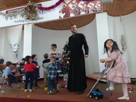Fr. Christopher Moore at the Church Christmas celebration in 2019