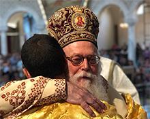 OCMC missionary embraced by His Beatitude Archbishop Anastasios of Albania