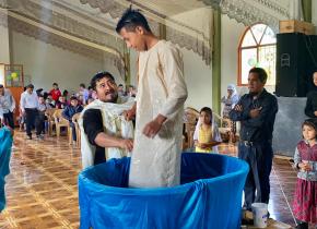 Fr. Evangelos baptizes a child in Guatemala